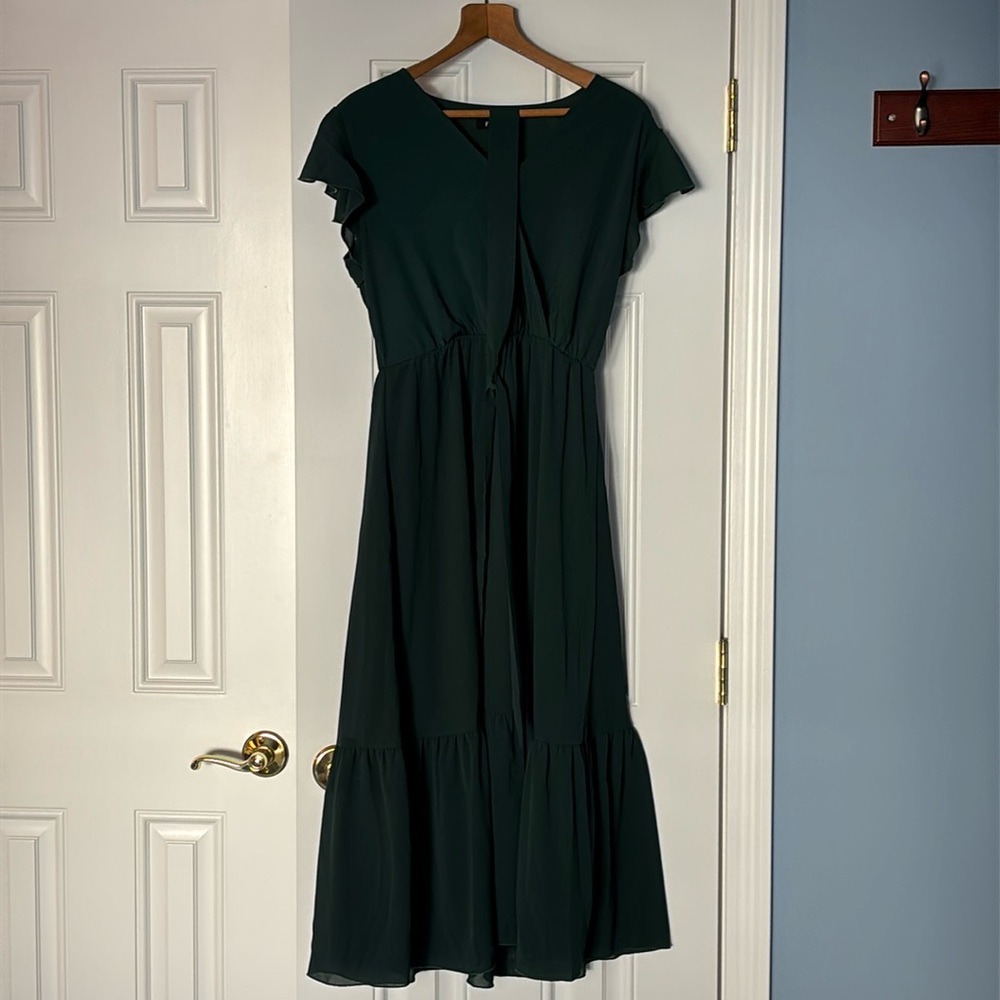 Hunter Green Dress by Fashion with lining on skirt area. Perfect for anything!